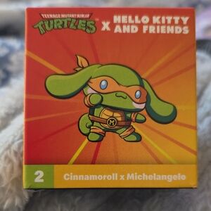 McDonald's Teenage Mutant Ninja Turtles x Hello Kitty Toy - Green and Orange